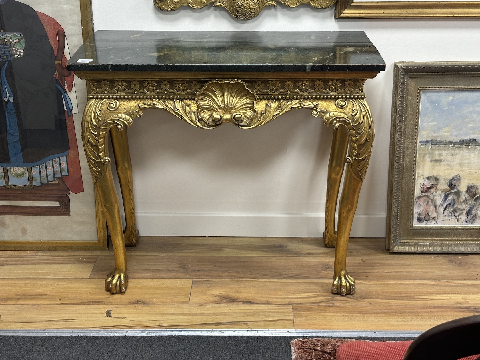 A George II style giltwood pier table, width 91cm, depth 45cm, height 79cm and a similar pier glass, width 61cm, height 115cm